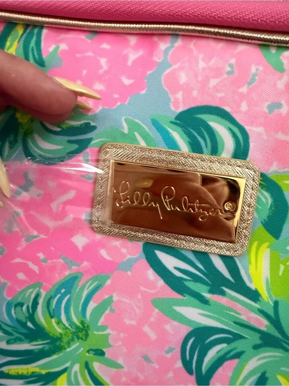 Women's floral pouch with brand plaque